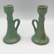 Pair of vintage table candle holders in green enameled ceramic
