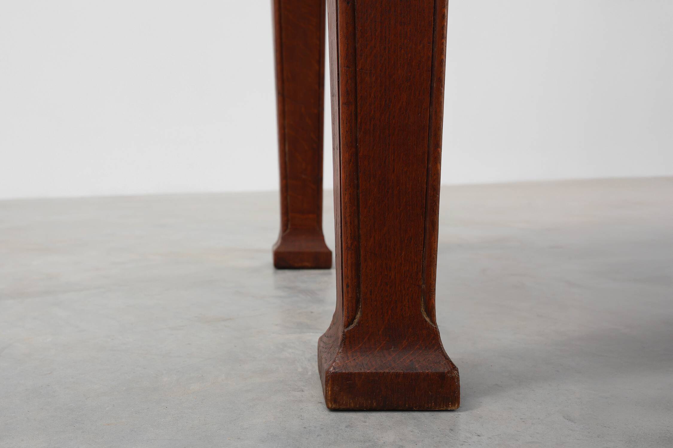 Oak Art Deco dining table with carved frieze, France 1920s