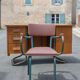 School teacher's chair in imitation leather and tubular metal