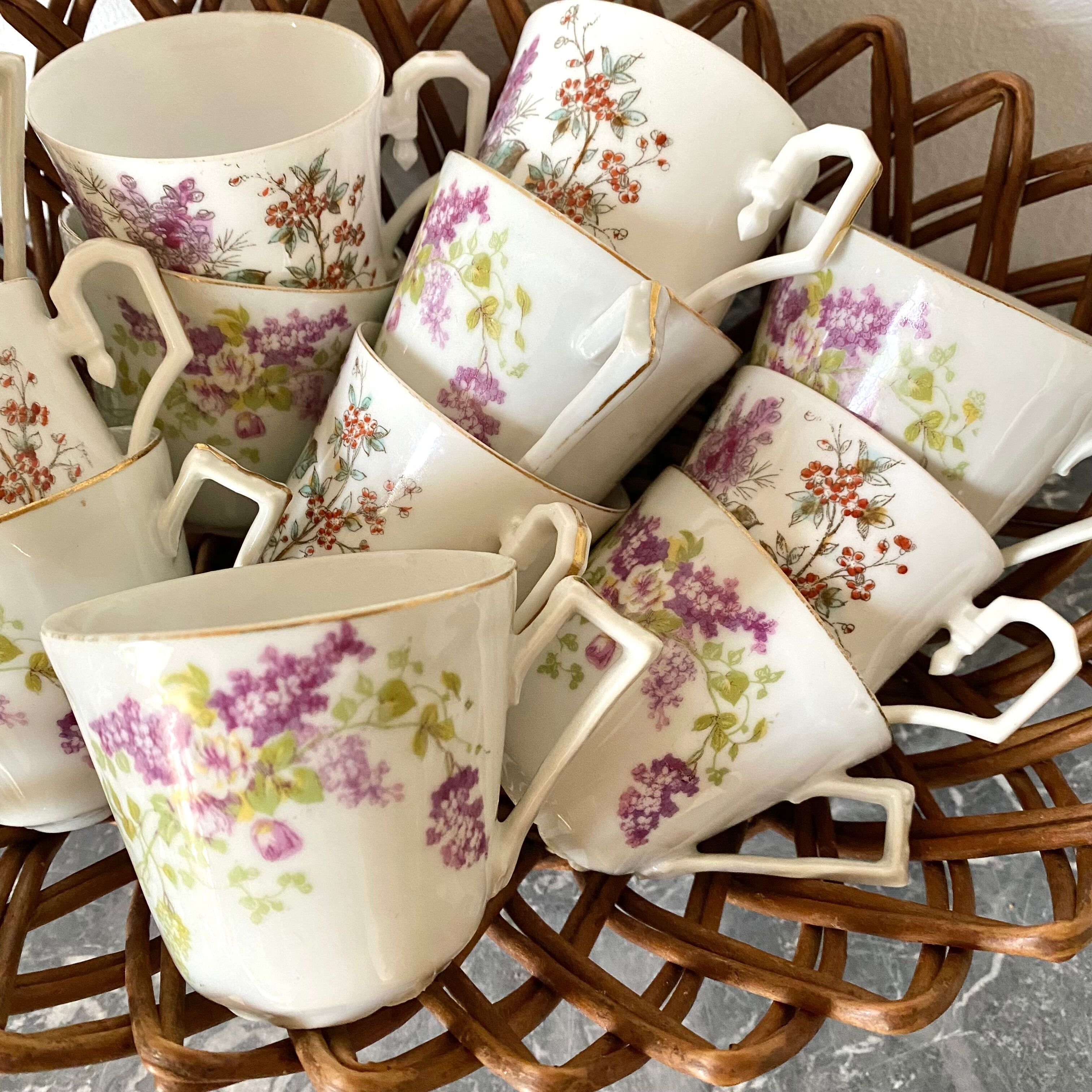 Antique flowered porcelain cups mismatched