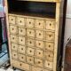 Antique Chinese apothecary cabinet with calligraphy