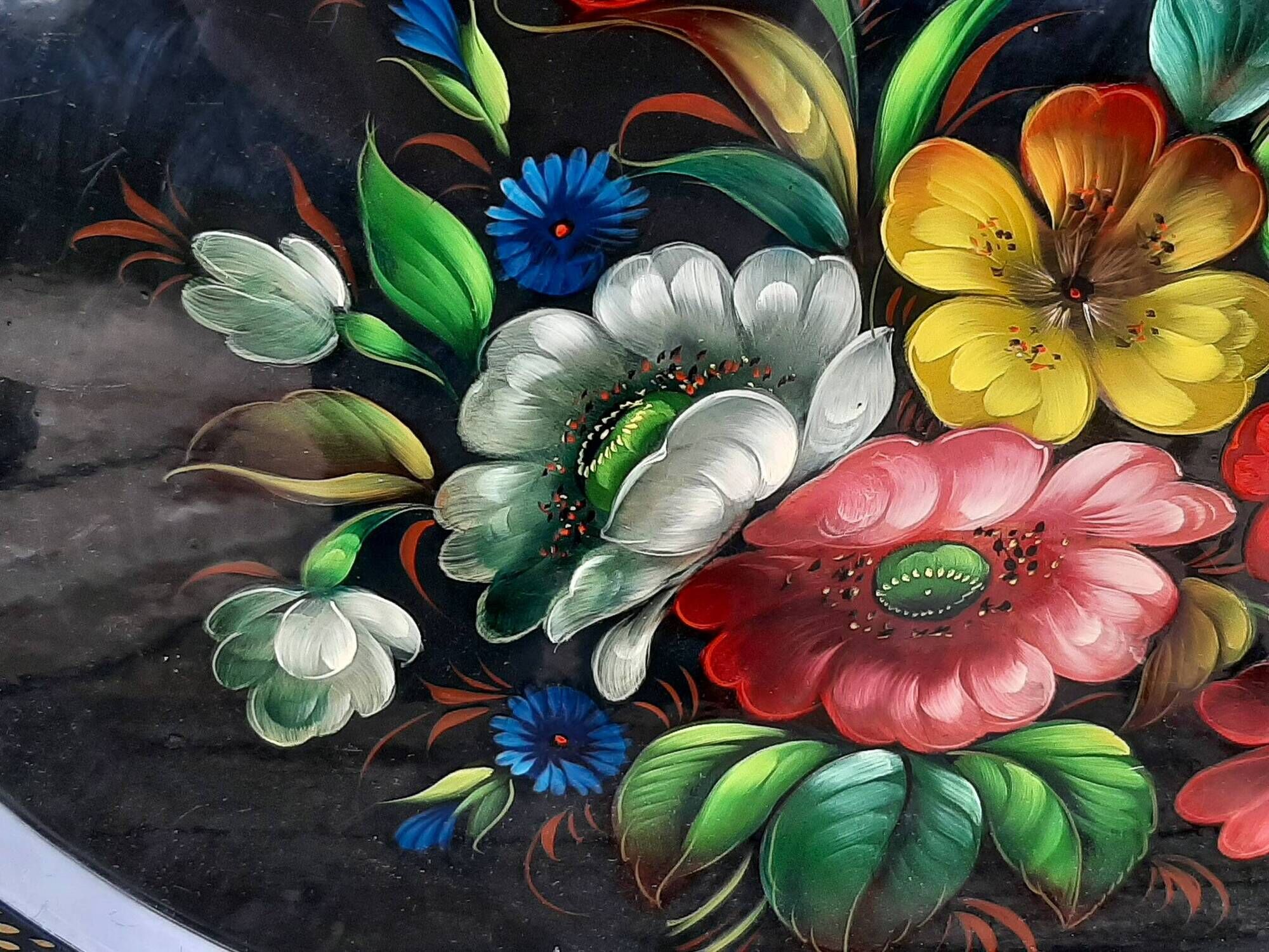 Black lacquered metal tray with multicoloured vintage Russian floral decoration.