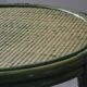 Green rattan side table.