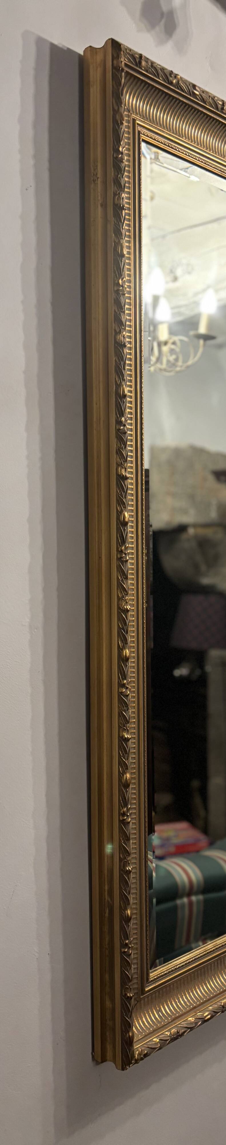 Large vintage gold rectangular mirror; highly sought after by decorators.