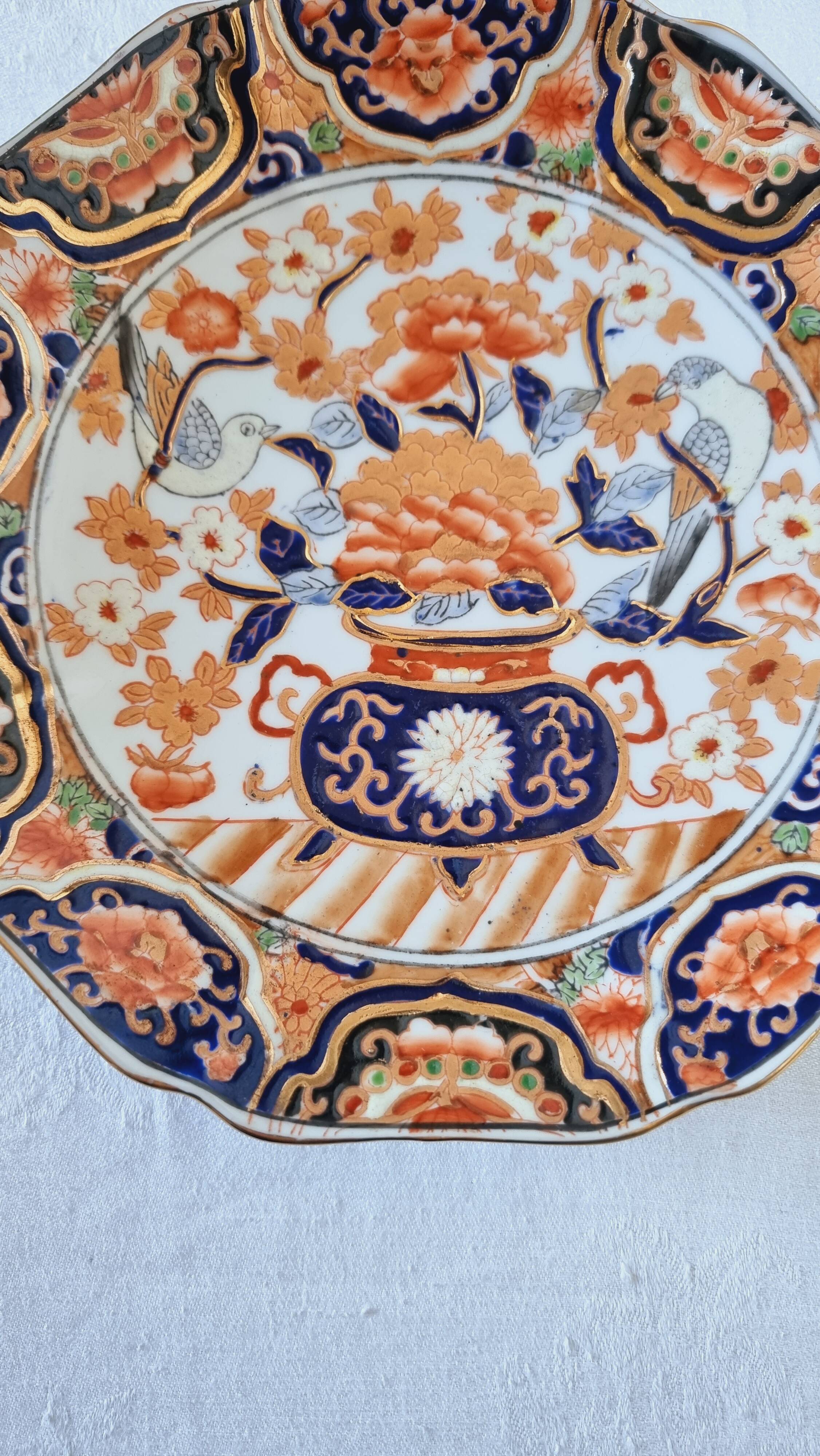 Imari-style porcelain plate, hand-painted, Japan, mid-20th century.