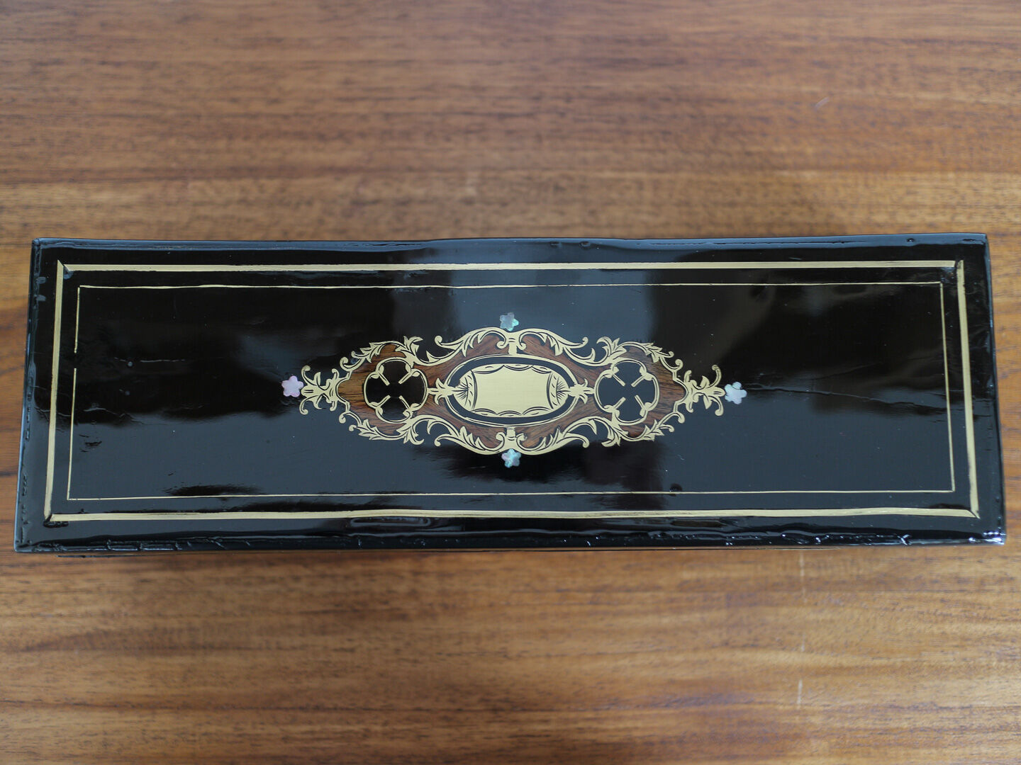 Glove box in ball marquetry