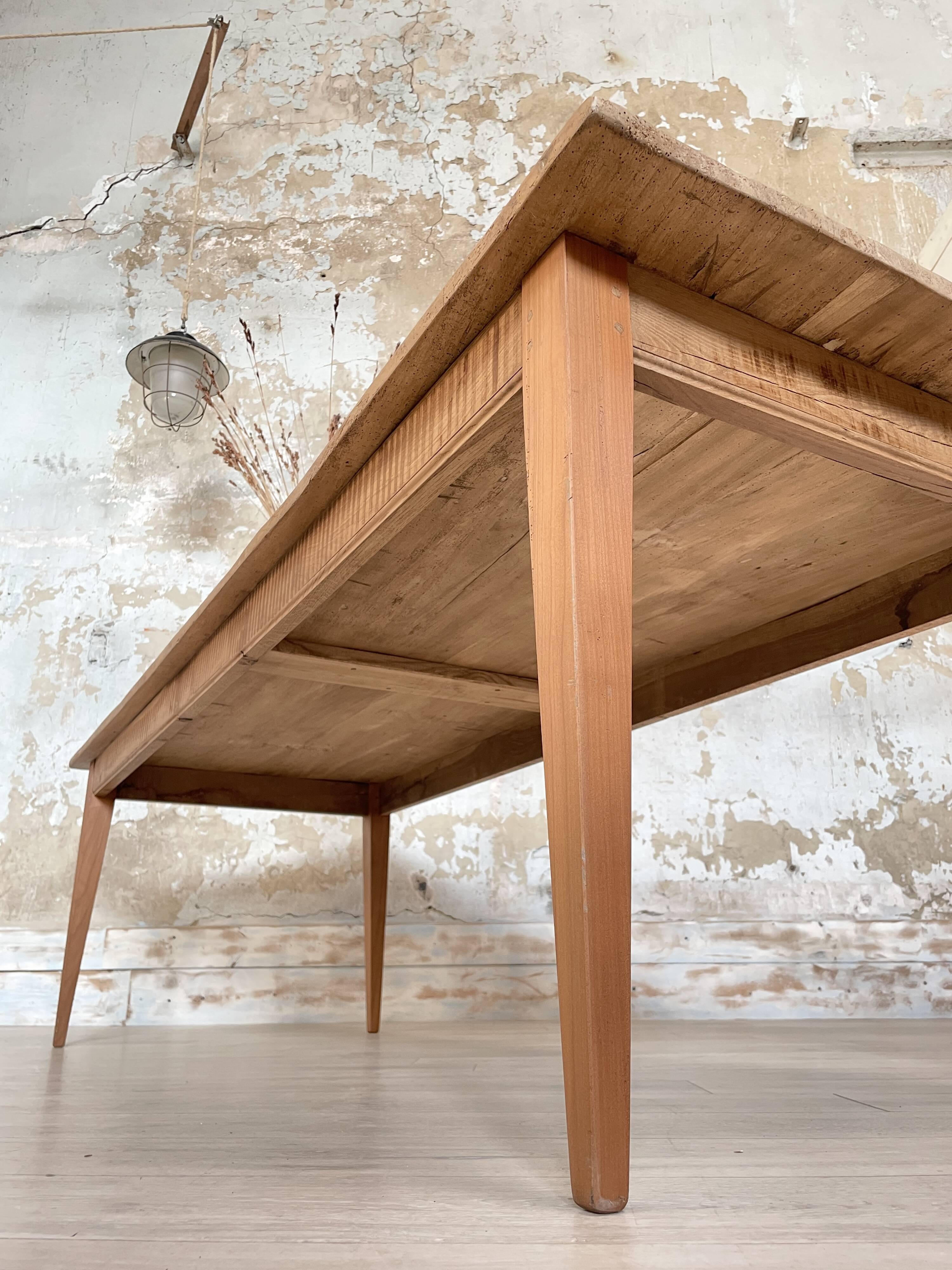 Vintage farm table with spindle legs.