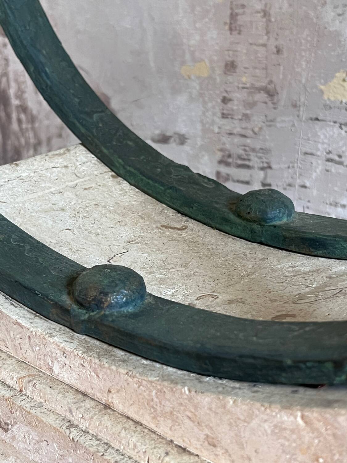 Console in glass and antique patinated metal
