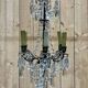 Early 20th century five-light chandelier with bronze and crystal drops