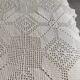 White cotton bedspread, crocheted sofa throw with star patterns