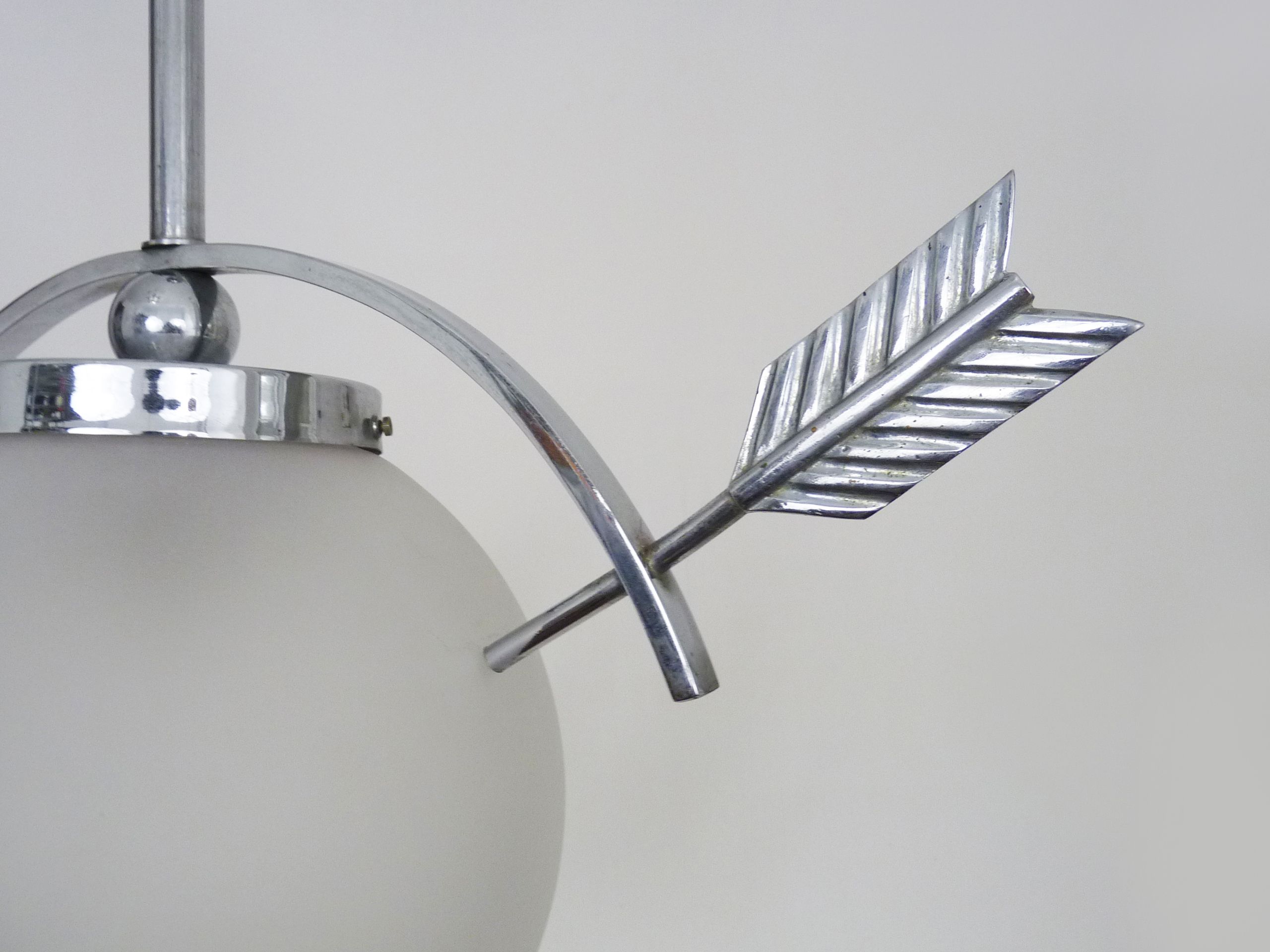 Suspension in chromed metal and glass, space age, arrow crossing a globe. Seventies