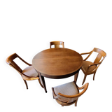 Round cherry table with extension, 3 chairs and 1 armchair.