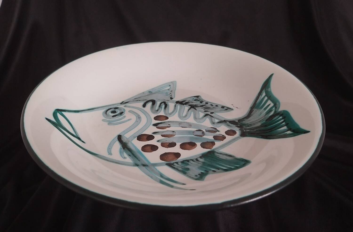 Assiette creuse à décor de poisson R.Picault