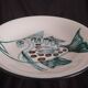 Assiette creuse à décor de poisson R.Picault