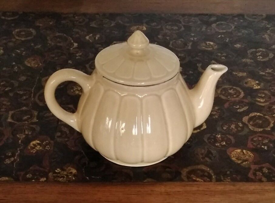 Cream-colored teapot