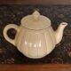 Cream-colored teapot