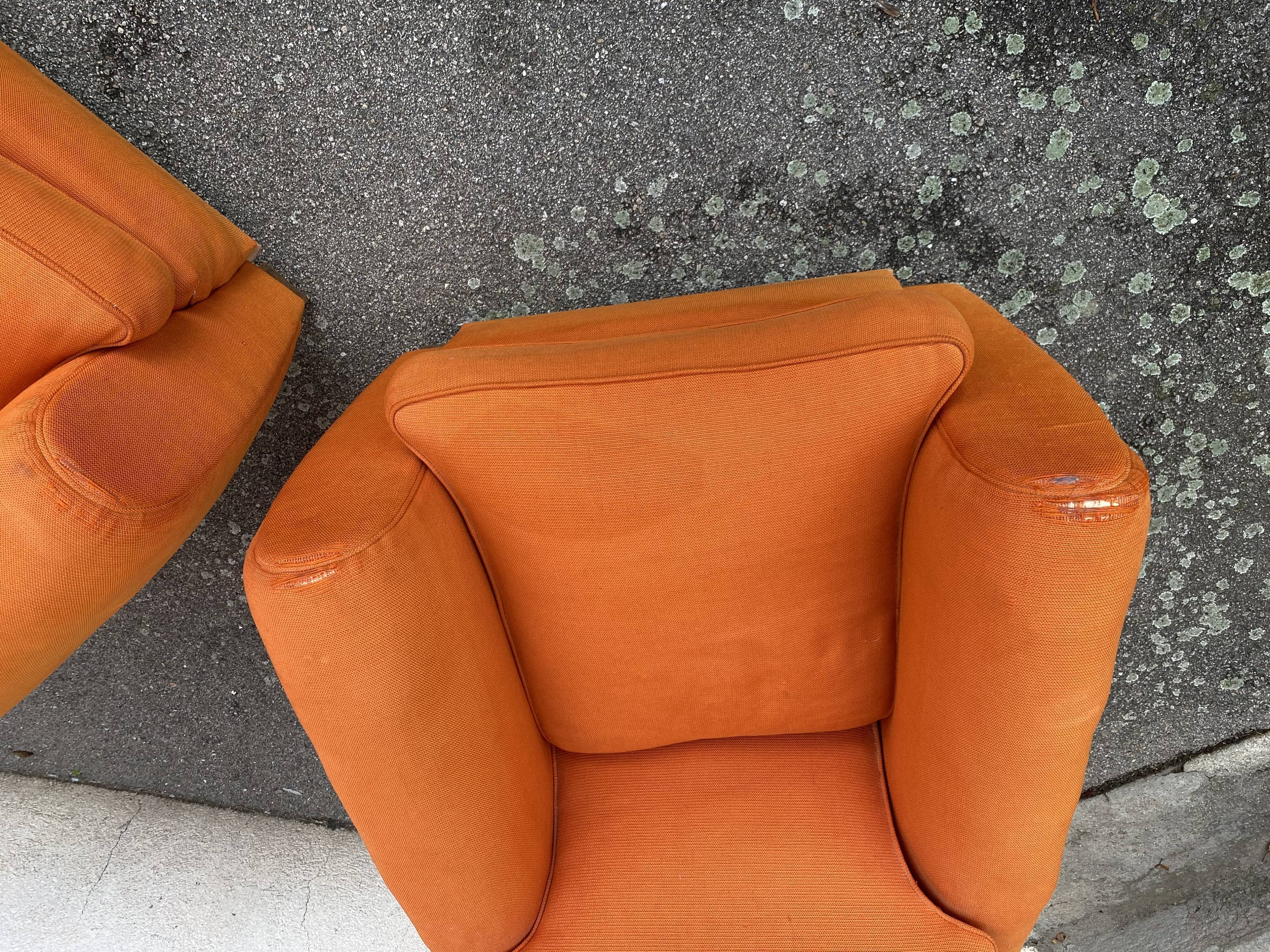 Pair of vintage orange club chairs
