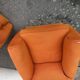 Pair of vintage orange club chairs