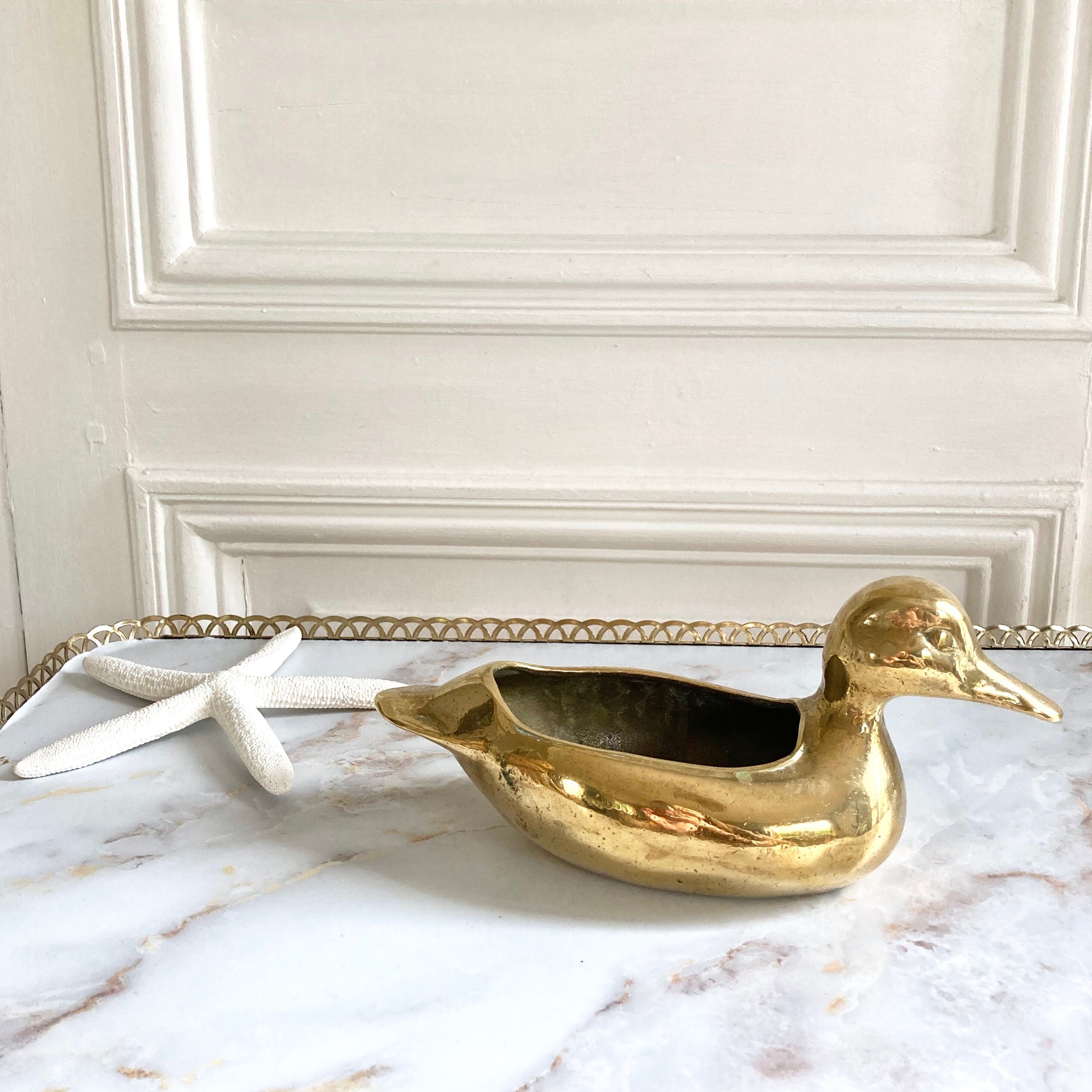 Empty solid brass duck pocket