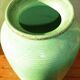 Enamelled earthenware vase with striated pattern