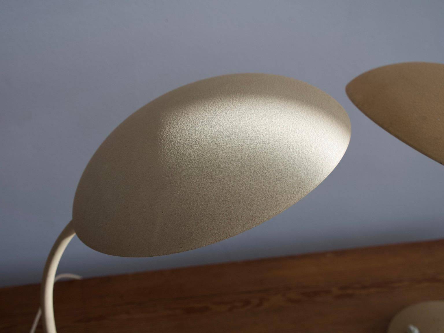 Pair of painted beige metal table lamps, 1930s