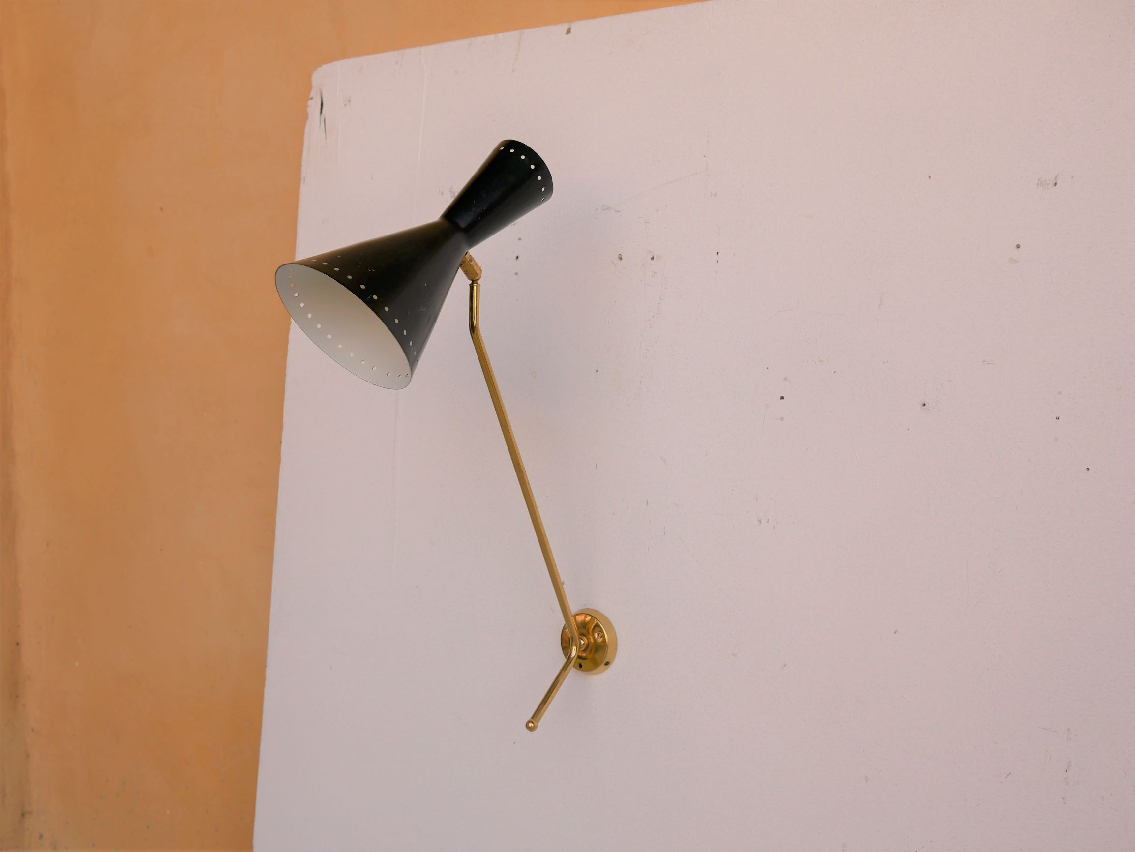 Vintage "Diabolo" wall apply in black metal and brass