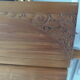 Headboard made with two art nouveau doors in walnut, waxed finish,