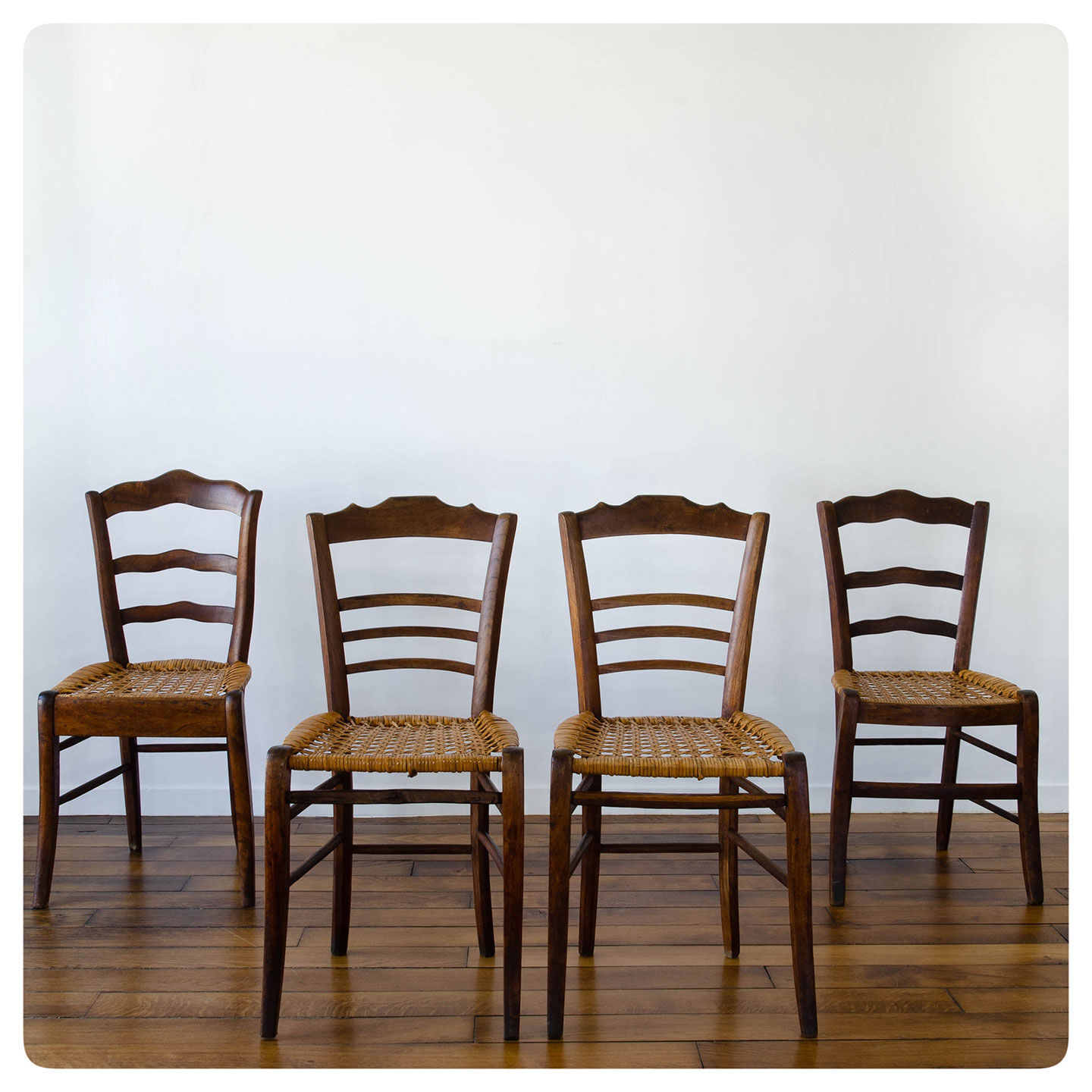4 old flying chairs with natural canning seat