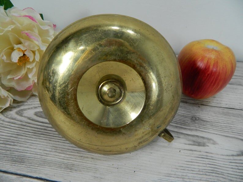 Brass candlestick with rise and fall