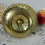 Brass candlestick with rise and fall