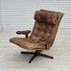 1960s, Scandinavian swivel armchair, brown furniture leather.