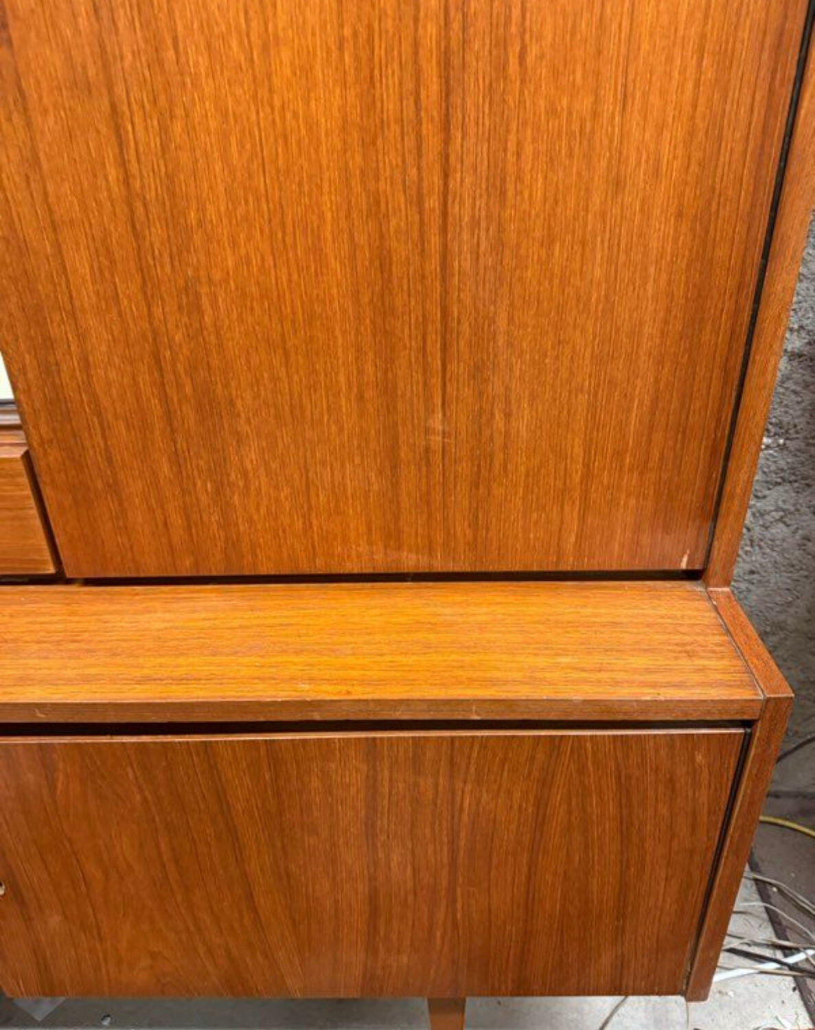 Vintage Scandinavian teak sideboard with compass feet from the 70s