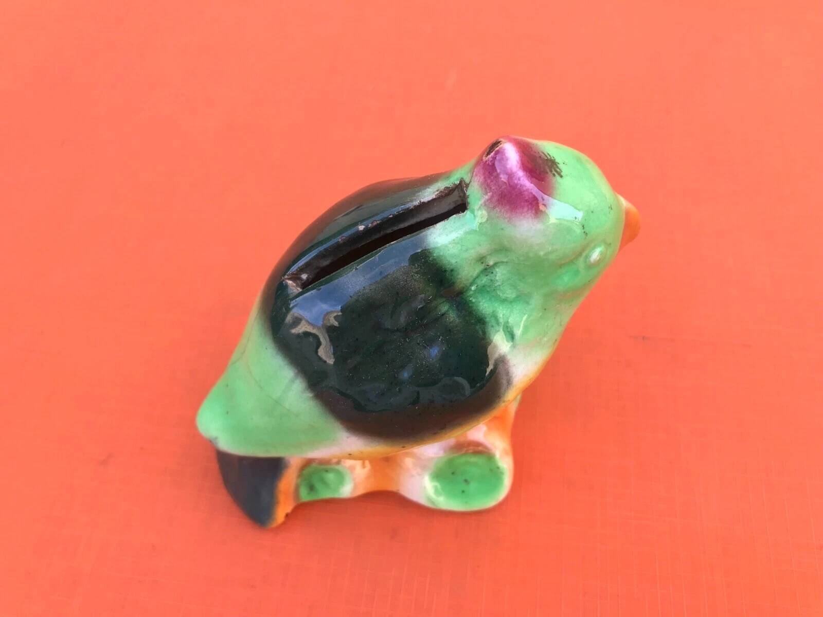 Polychrome ceramic parrot shape