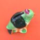 Polychrome ceramic parrot shape