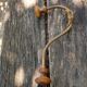 Wooden and metal wall coat rack.