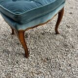Armchair in walnut and blue velvet