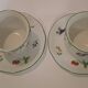Two cups and saucers in fine porcelain, orchard model.