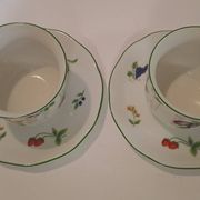 Two cups and saucers in fine porcelain, orchard model.