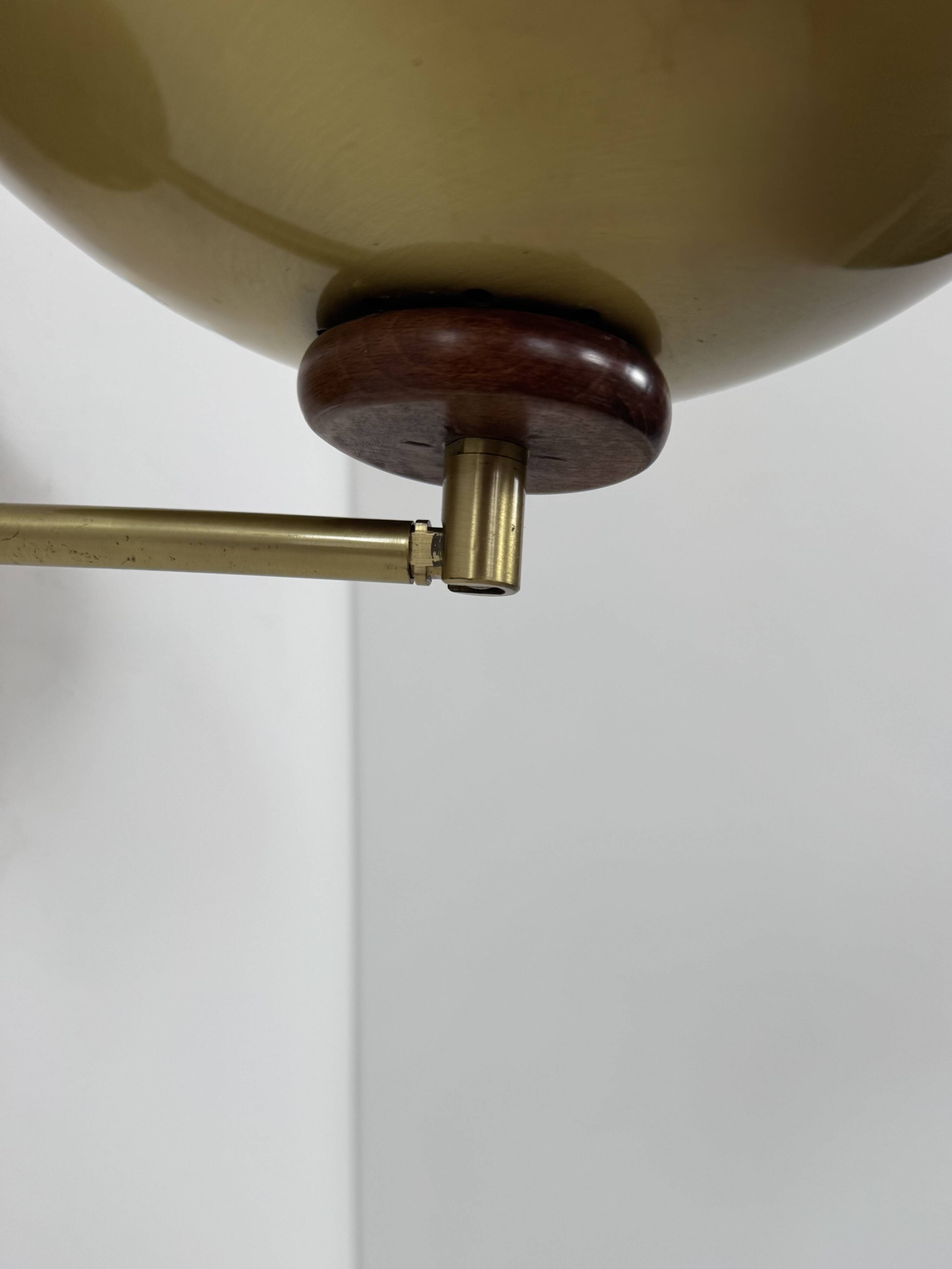 Vintage adjustable wall light, brass and wood, France 1970.