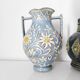 Two small blue ceramic vases