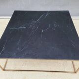 Coffee table or black marble and brass display "in its own juice"