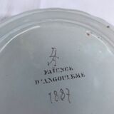 Pair of plates in Angoulême earthenware dated and signed nineteenth century