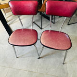Pair of raspberry-colored chairs from the 60s/70s with metal legs