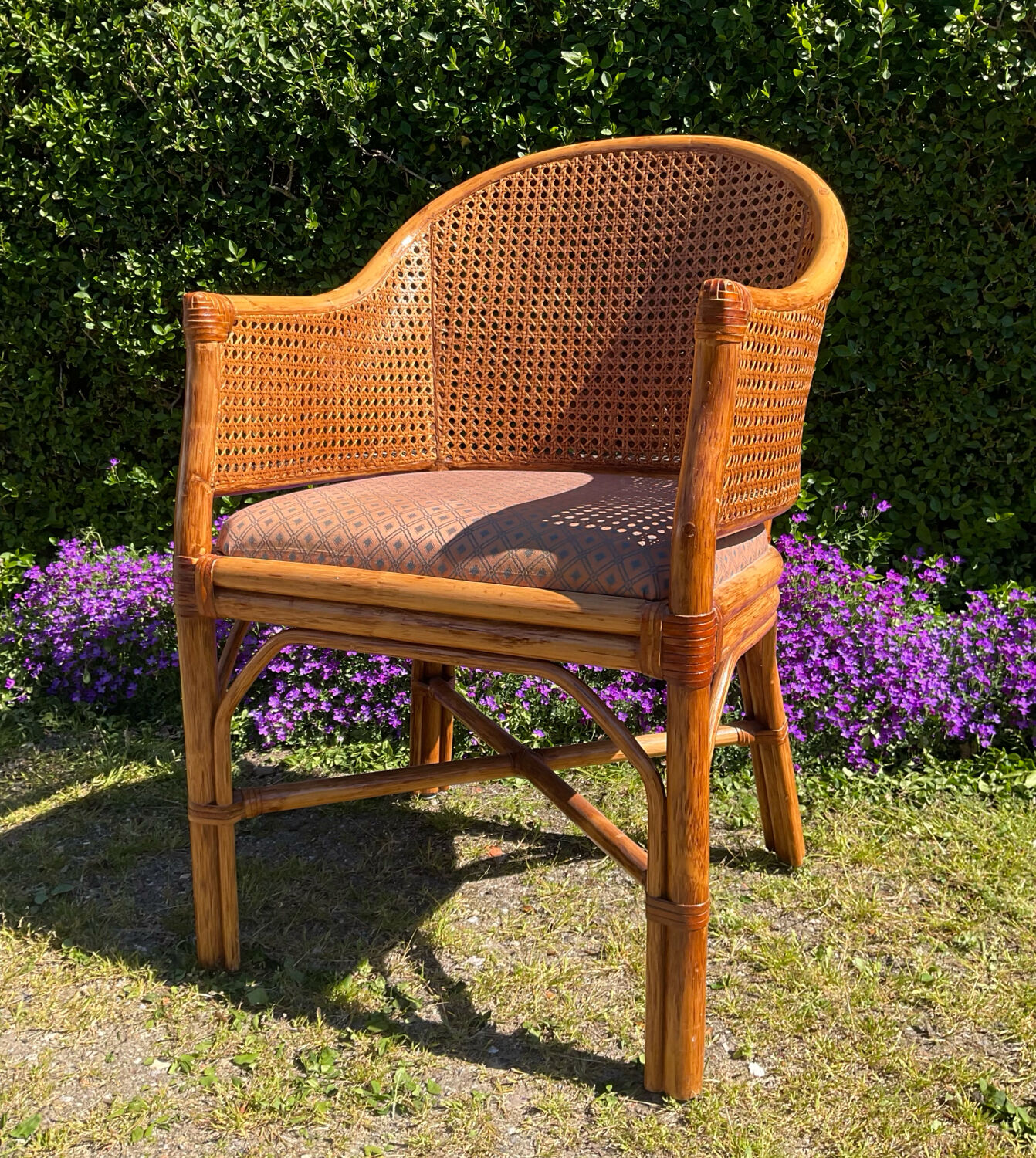 Mc Guire style armchair in rattan and caning from the 1980s.