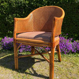 Mc Guire style armchair in rattan and caning from the 1980s.