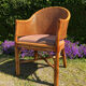 Fauteuil Style Mc Guire en rotin et cannage années 80