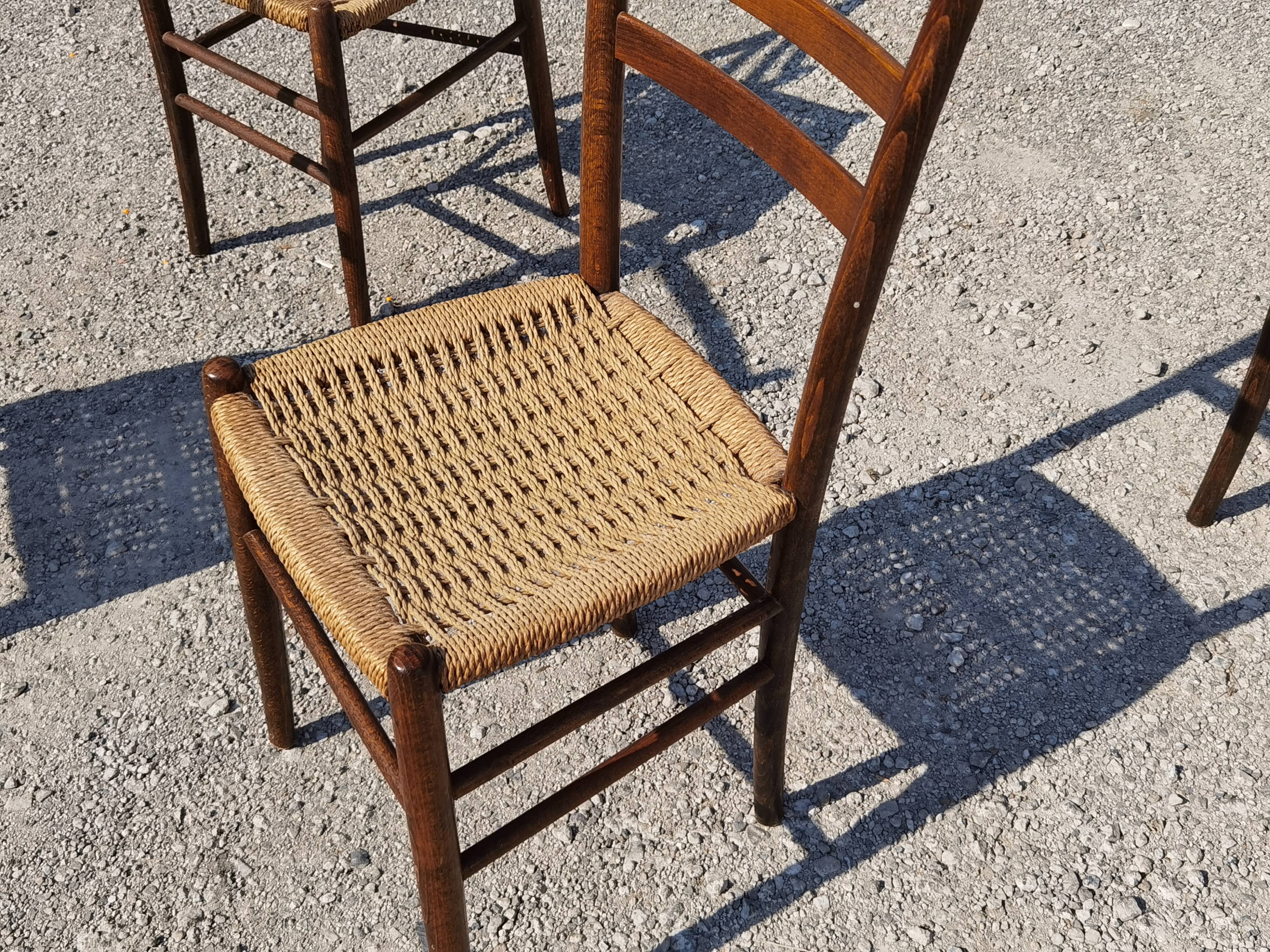 Set of 4 wooden chairs and rope