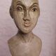 Trio of wooden busts