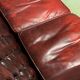 Chesterfield 2-seater leather-eared sofa from the 80s