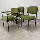 2 chairs and 1 office armchair from the 1950s in green velvet and black metal.